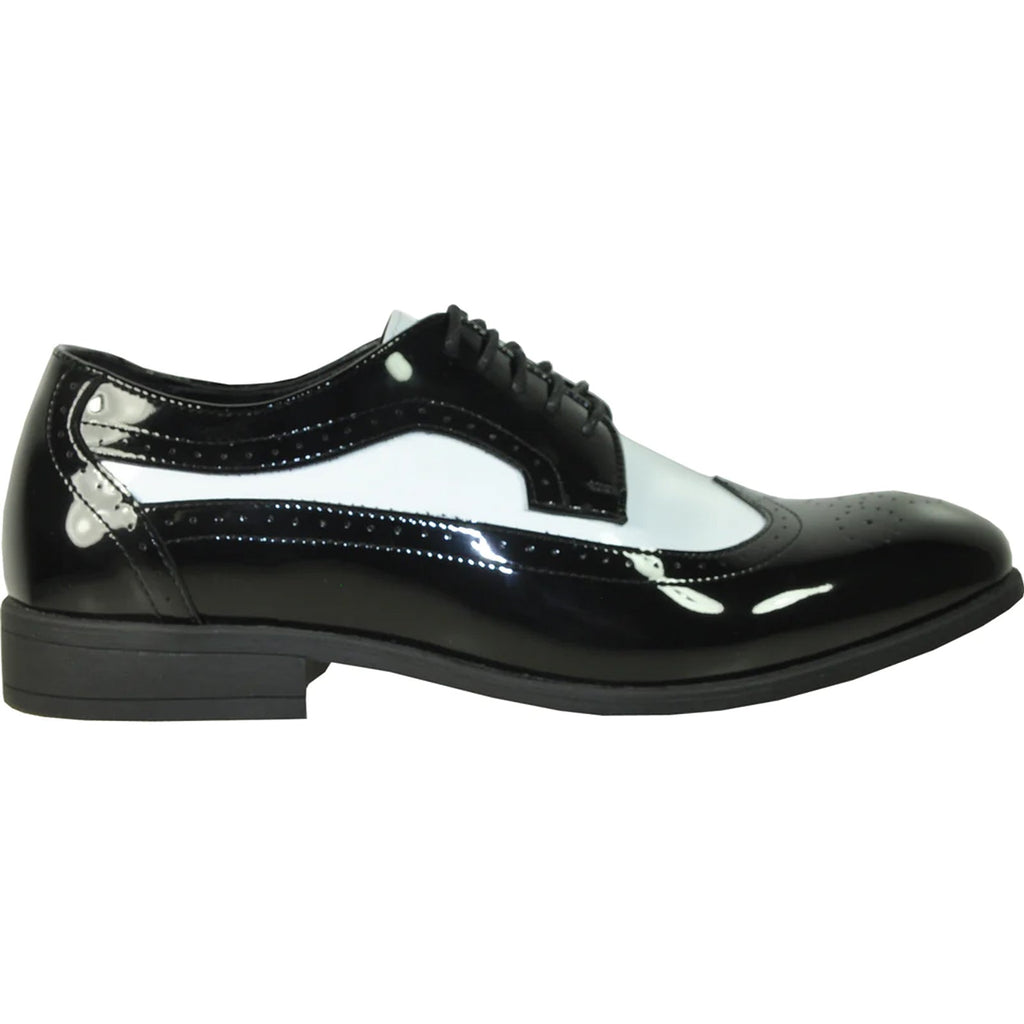 Model wearing two-tone wingtip patent lace-up dress shoe in black and white – TARLANO