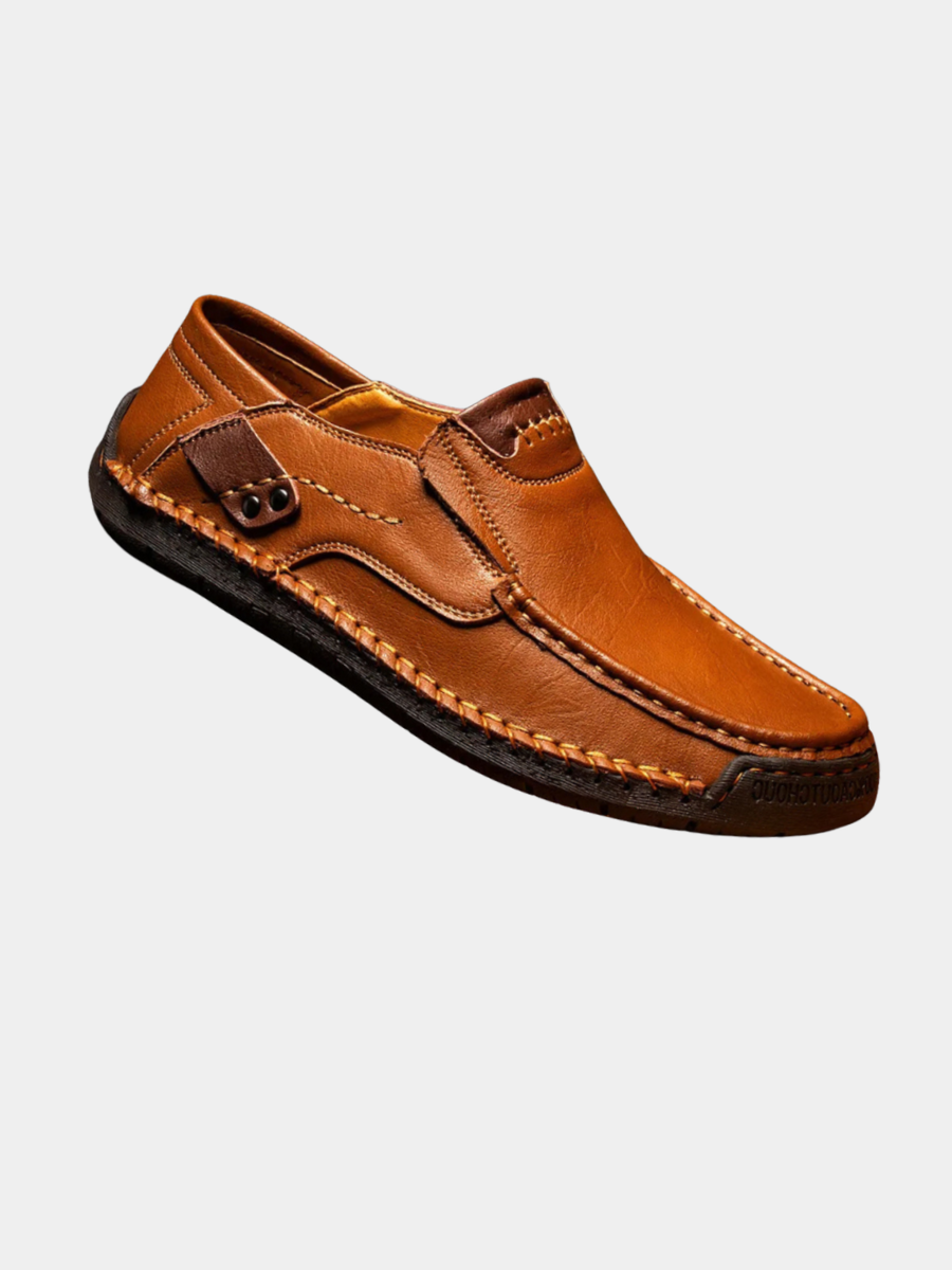 Close-up of light brown leather slip-on loafer with hand-stitched welt – TARLANO