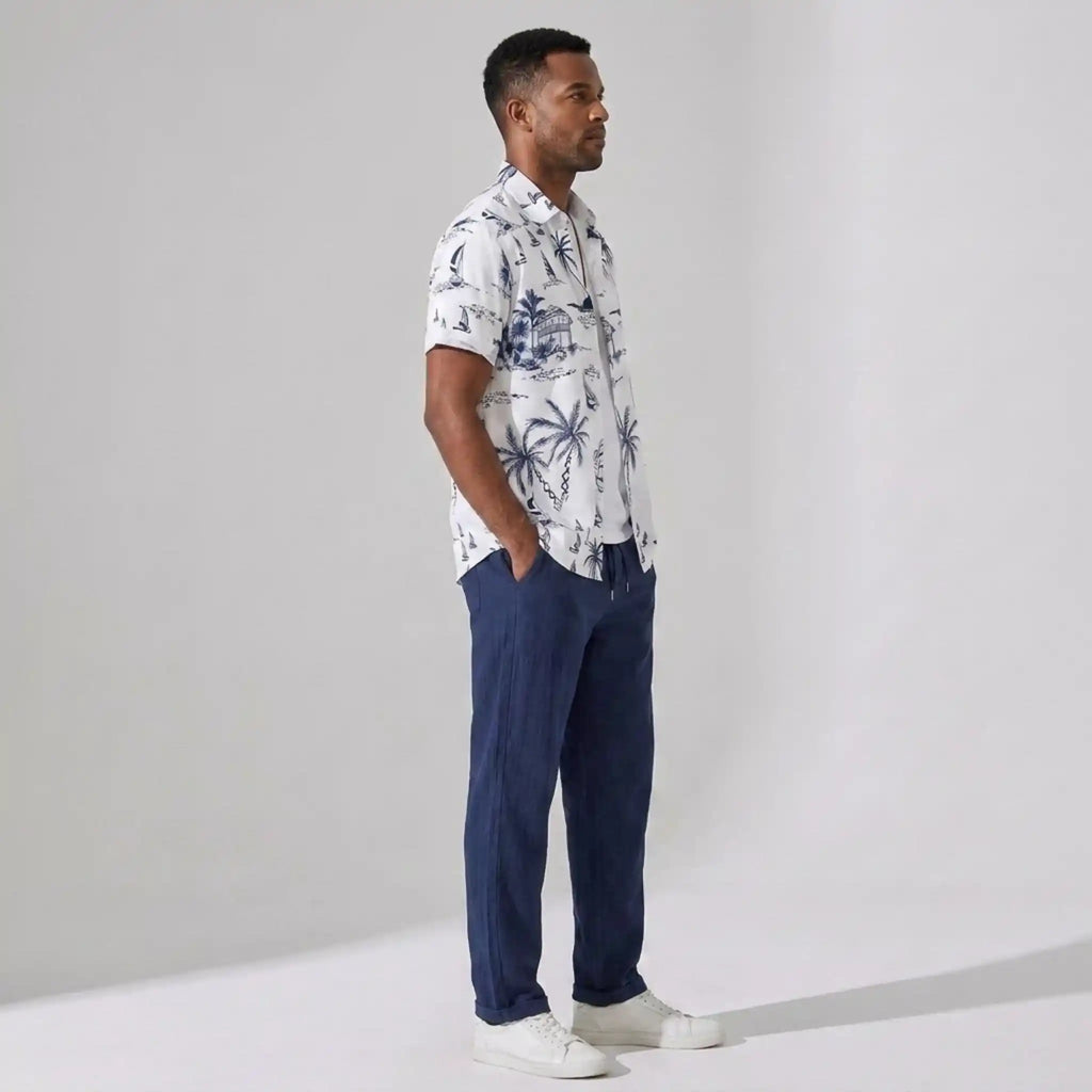 Model wearing island print shirt and straight leg pants set in white – TARLANO