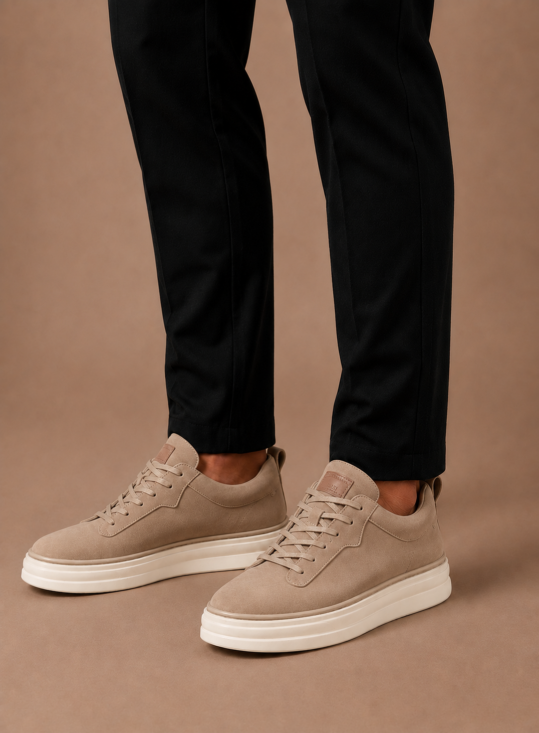 Model wearing men's suede casual slip-on sneaker in brown – TARLANO