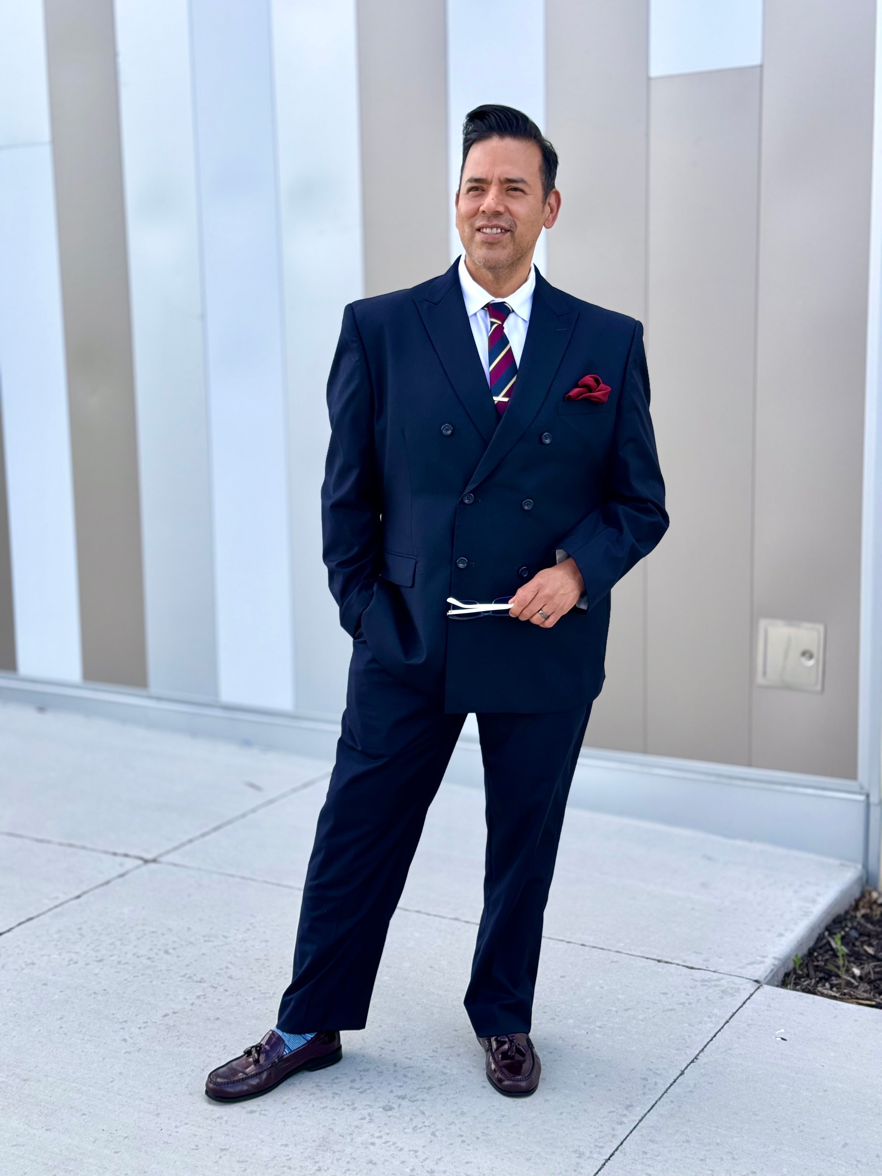 Model wearing navy double breasted poplin suit – TARLANO
