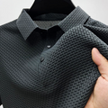 Close-up detail of pique polo shirt in Beige – TARLANO