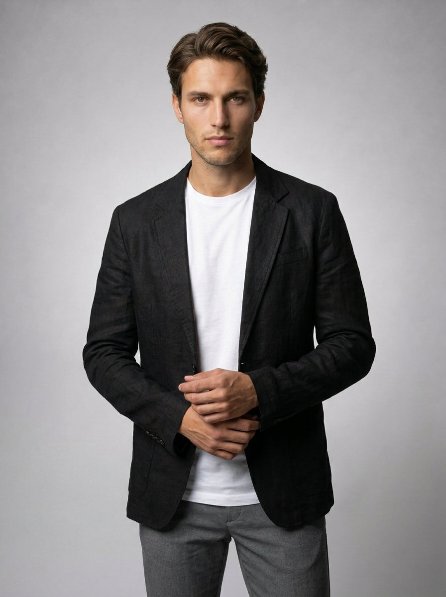 Model wearing unstructured linen blazer in black – TARLANO