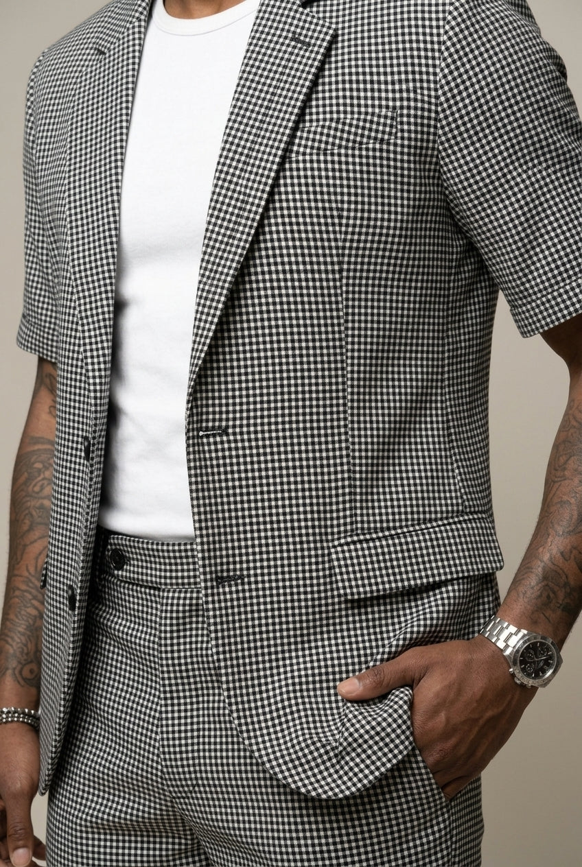 Model wearing check short sleeve blazer and matching shorts two-piece set – TARLANO