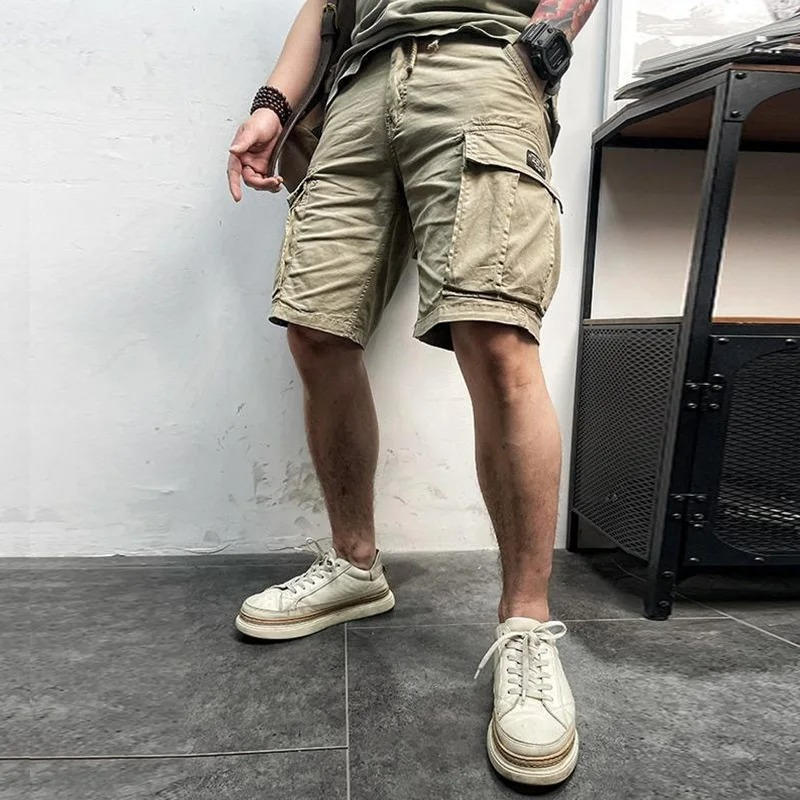 Close-up of snap cargo pocket on khaki cotton cargo shorts – TARLANO
