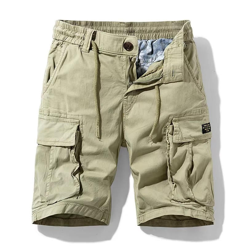 Model wearing khaki knee-length cotton cargo shorts – TARLANO