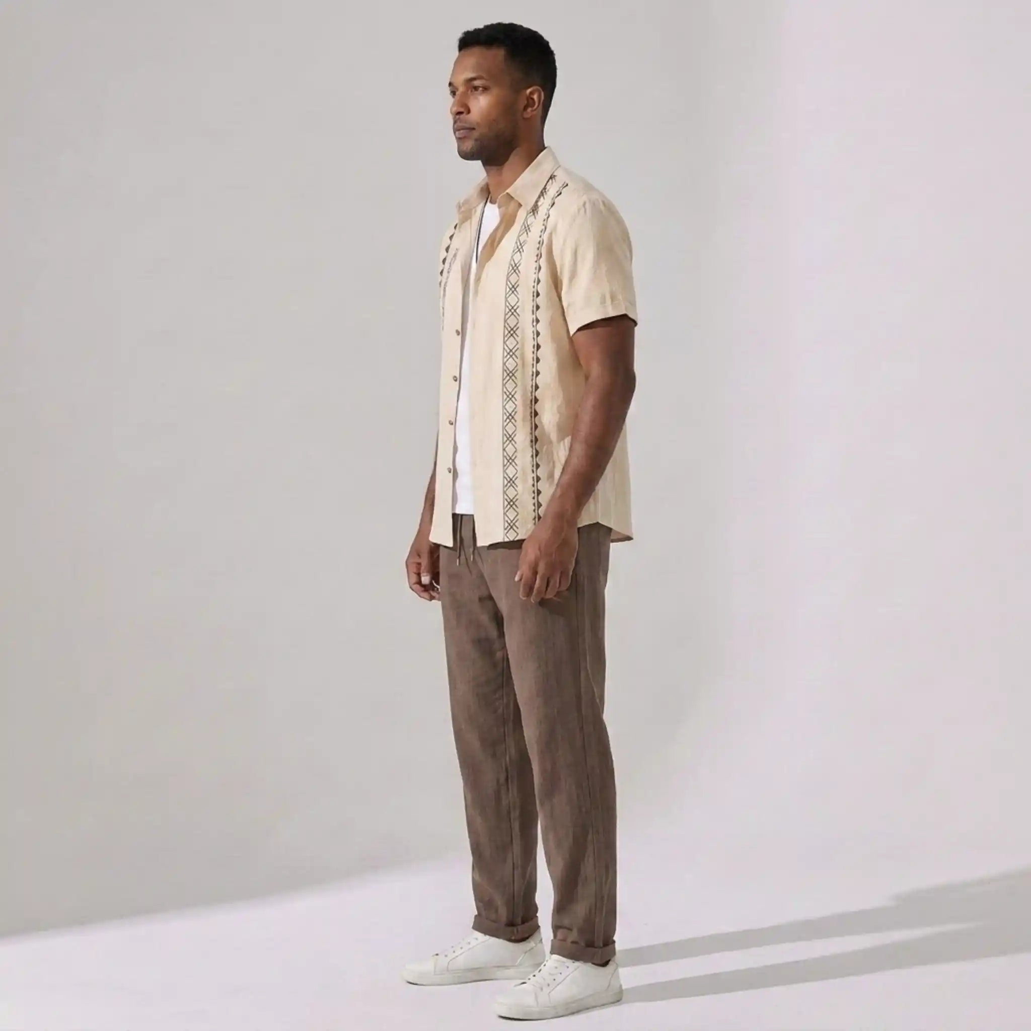 Model wearing beige geometric print shirt and cropped linen blend pants set – TARLANO