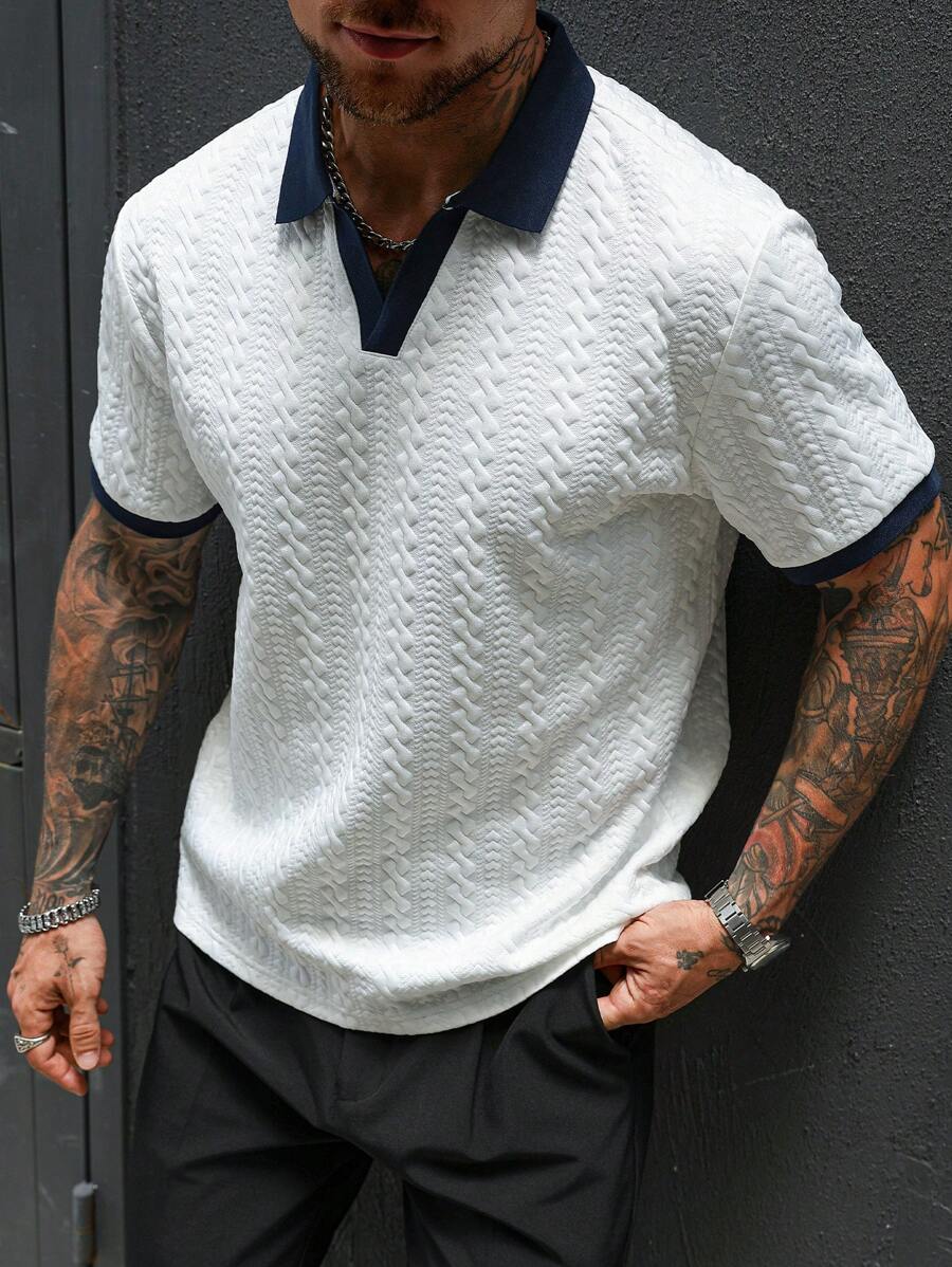Close-up contrast binding detail on knit polo shirt in black – TARLANO