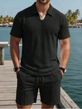 Model wearing knit polo short set in black – TARLANO