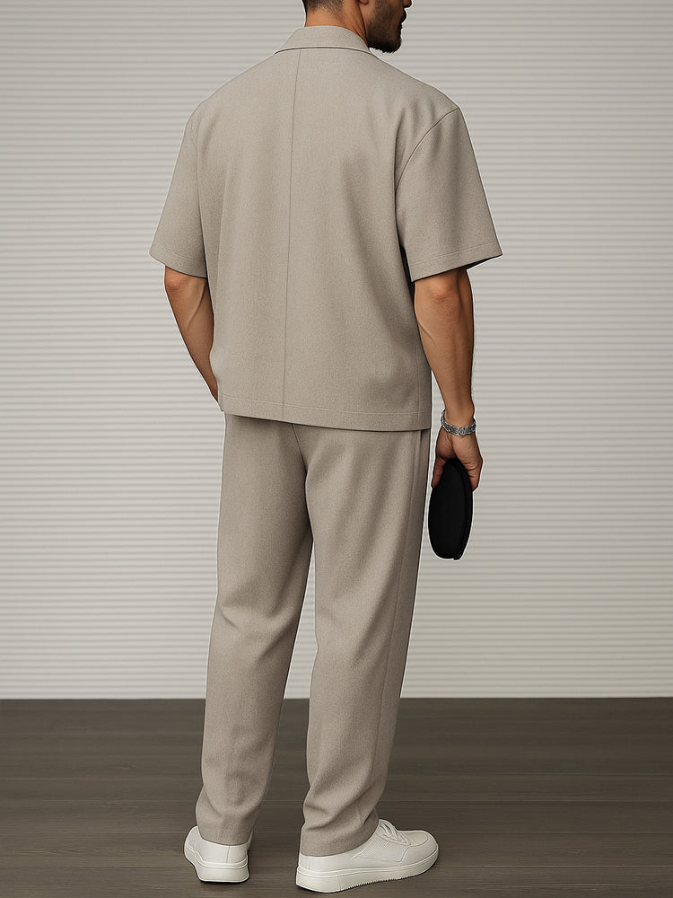 Model wearing khaki short sleeve blazer and trouser two-piece set – TARLANO
