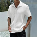 Model wearing Cuban collar textured button-front shirt in white – TARLANO